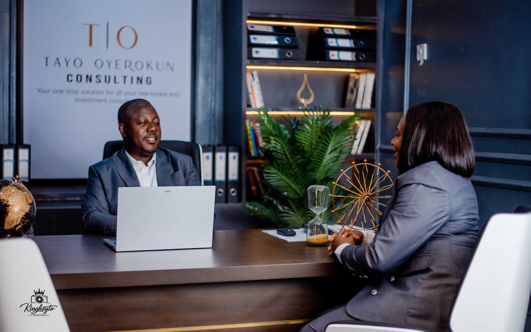 Engr. Omotayo Oyerokun in an office consultation with another professional